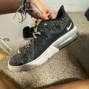 US size 8. Nike air maxes. Black and gray. Only wore a few times out grew them.